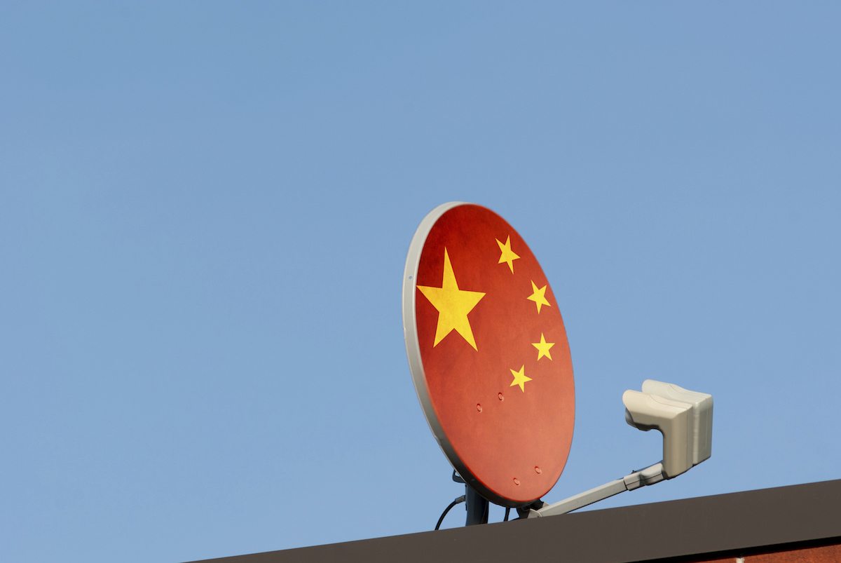 A satellite dish with a Chinese flag drawn on it